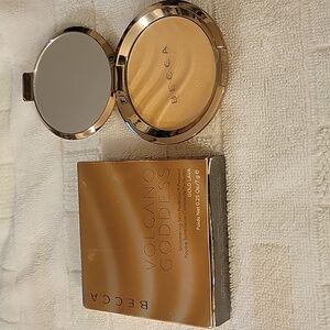 Becca volcano goddess shimmer skin perfector in Gold Lava